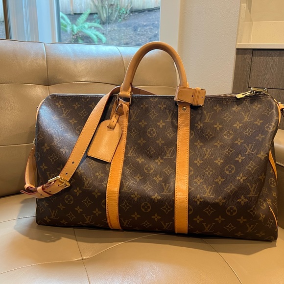 Louis Vuitton Handbags - Louis Vuitton Monogram keepall bandouliere 50 travel bag